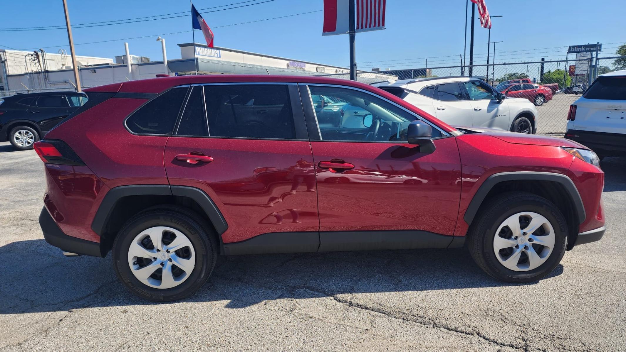 2023 Red Toyota RAV4 LE (2T3H1RFV9PW) with an 2.5L L4 DOHC 16V engine, 8A transmission, located at 1842 Wirt Road, Houston, TX, 77055, (713) 973-3903, 29.805330, -95.484787 - Photo #4